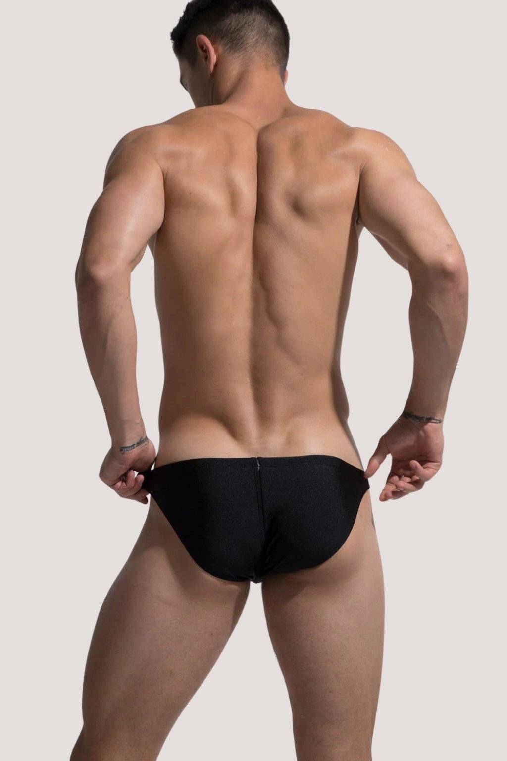 man-wearing-bikini-side-cut-swim-briefs.jpg