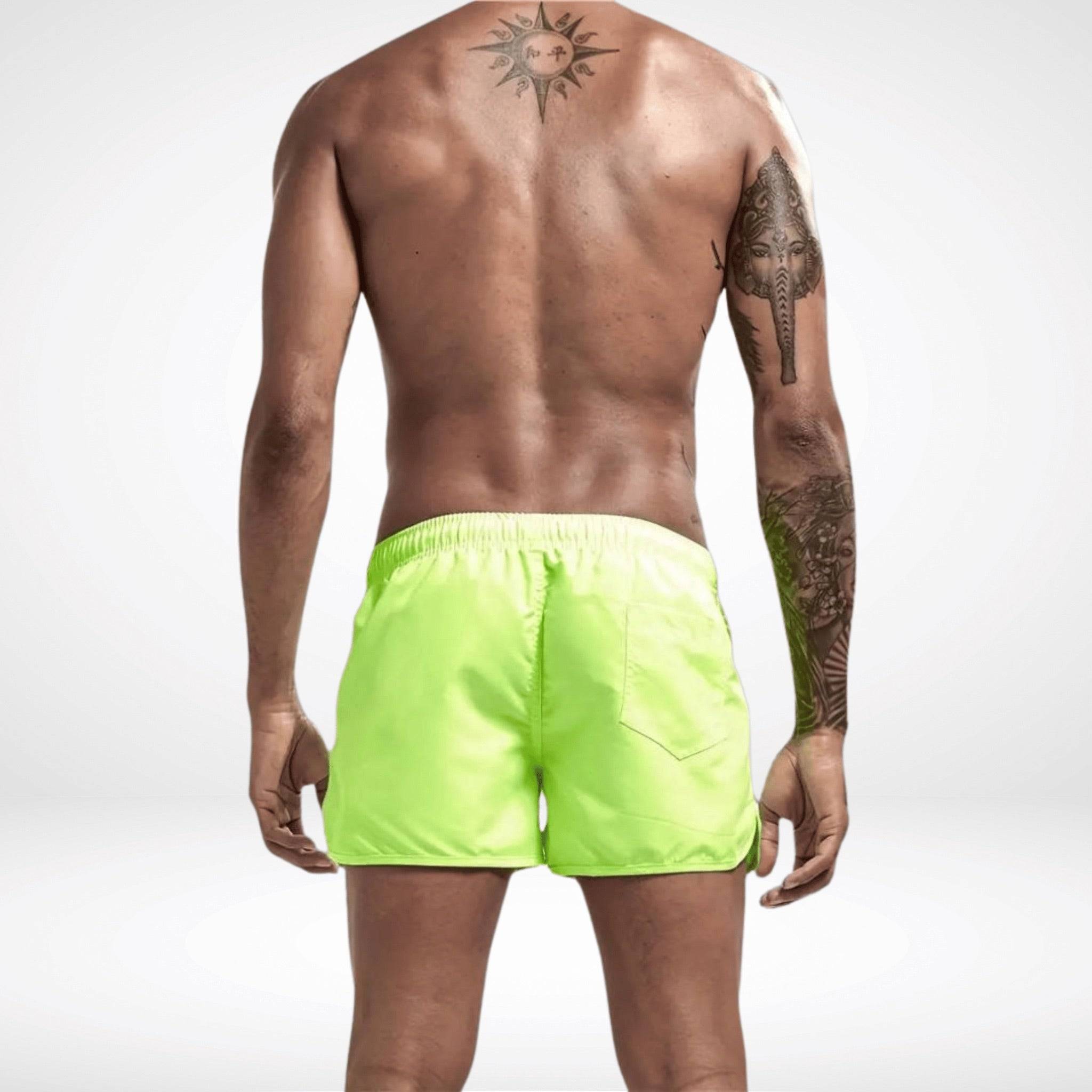 Back view of neon green Classic Short Shorts with elastic waistband and rear pocket, ideal for active summer adventures.