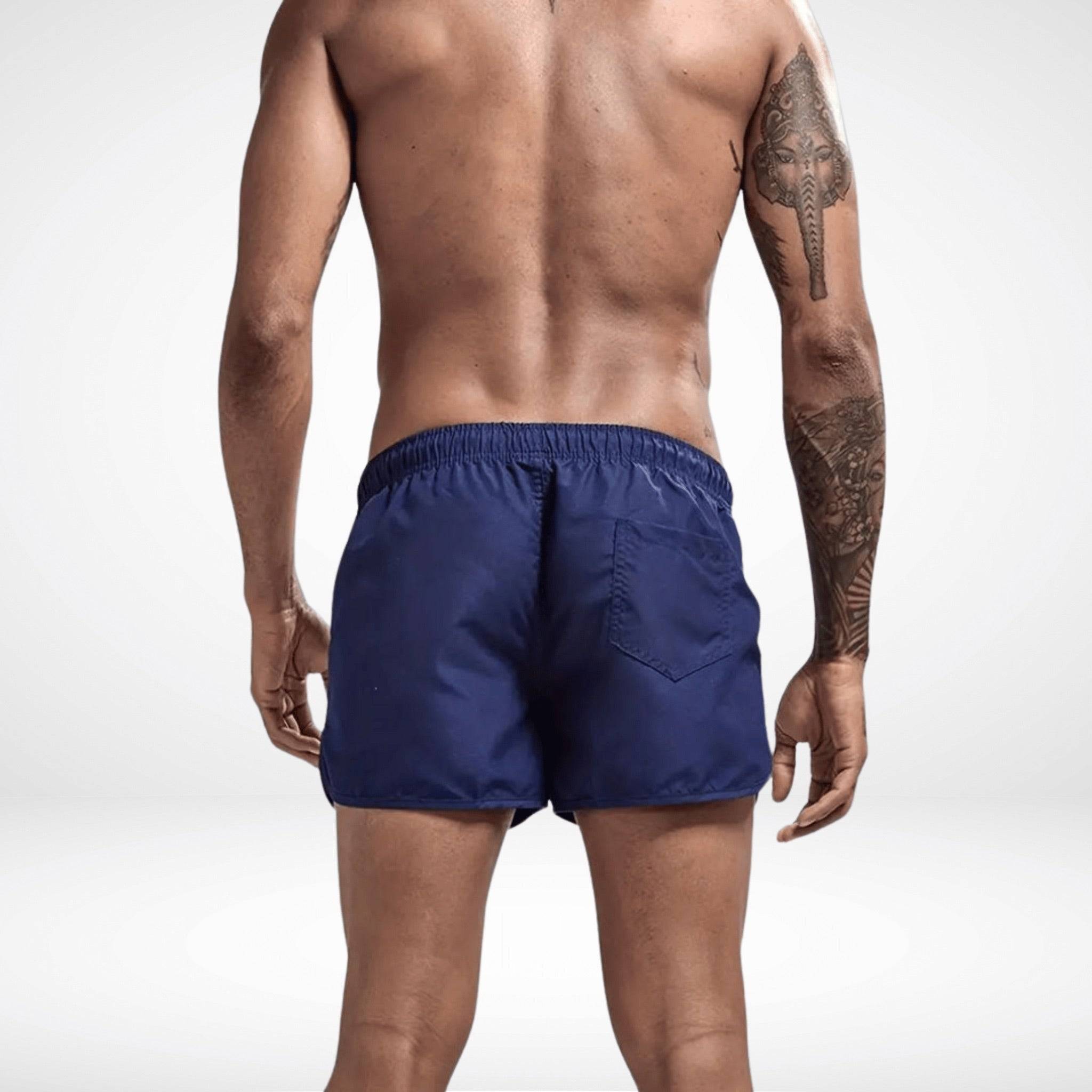 Back view of navy Classic Short Shorts with rear pocket and elastic waistband, combining function and sleek summer style.