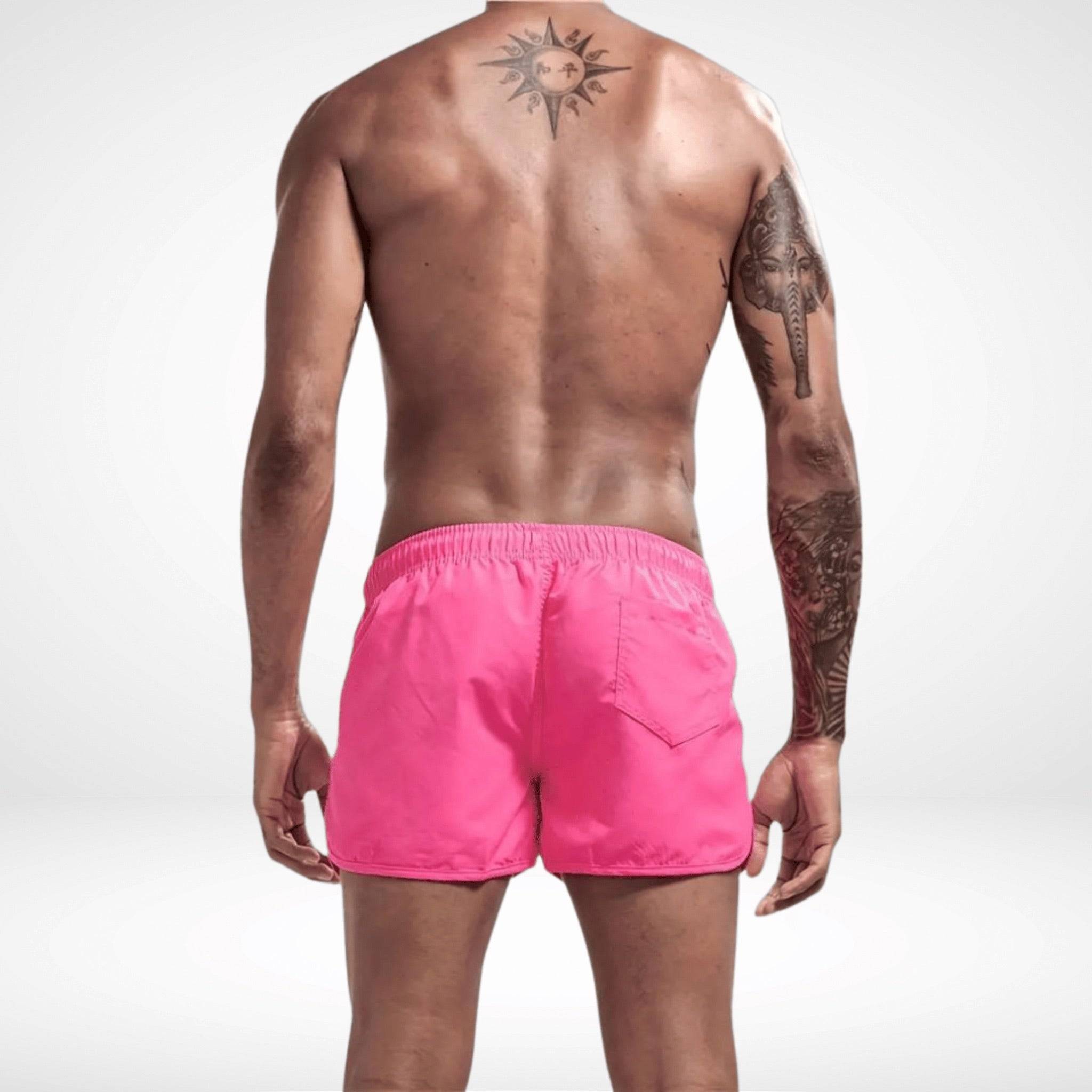 Back view of hot pink Classic Short Shorts with elastic waistband and rear pocket, perfect for vibrant summer fashion.