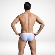 EnhanceFit Swim Briefs – Men's Quick-Dry Adjustable Fit in white, back view showing smooth, form-fitting swimwear design.
