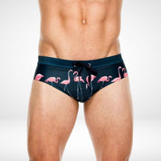 Front close-up of Flamingo Print Swim Briefs – Fun, Quick-Dry Men's Swimwear with pink flamingo design and adjustable drawstring for a secure fit.