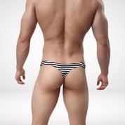 Back view of black and white Low-Rise Striped Cotton Thong, designed for confident wear and a sculpted fit.