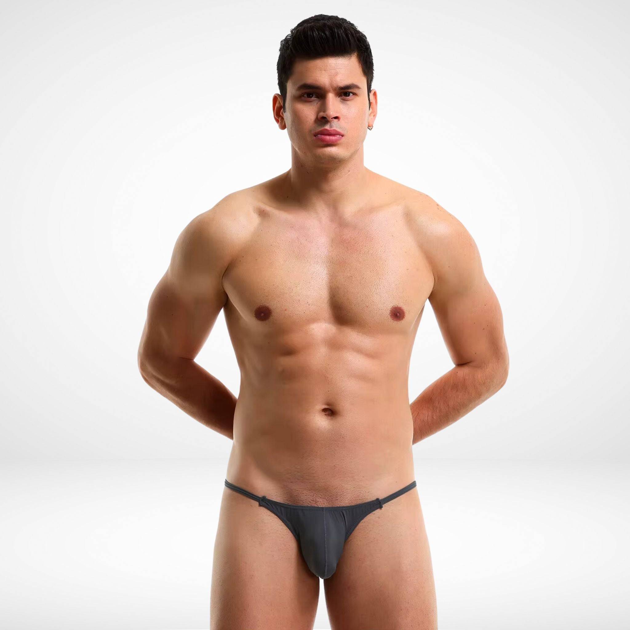 Men's gray T-Back Comfort Pouch Thong with a sleek design, breathable fabric, and supportive front pouch for all-day comfort.