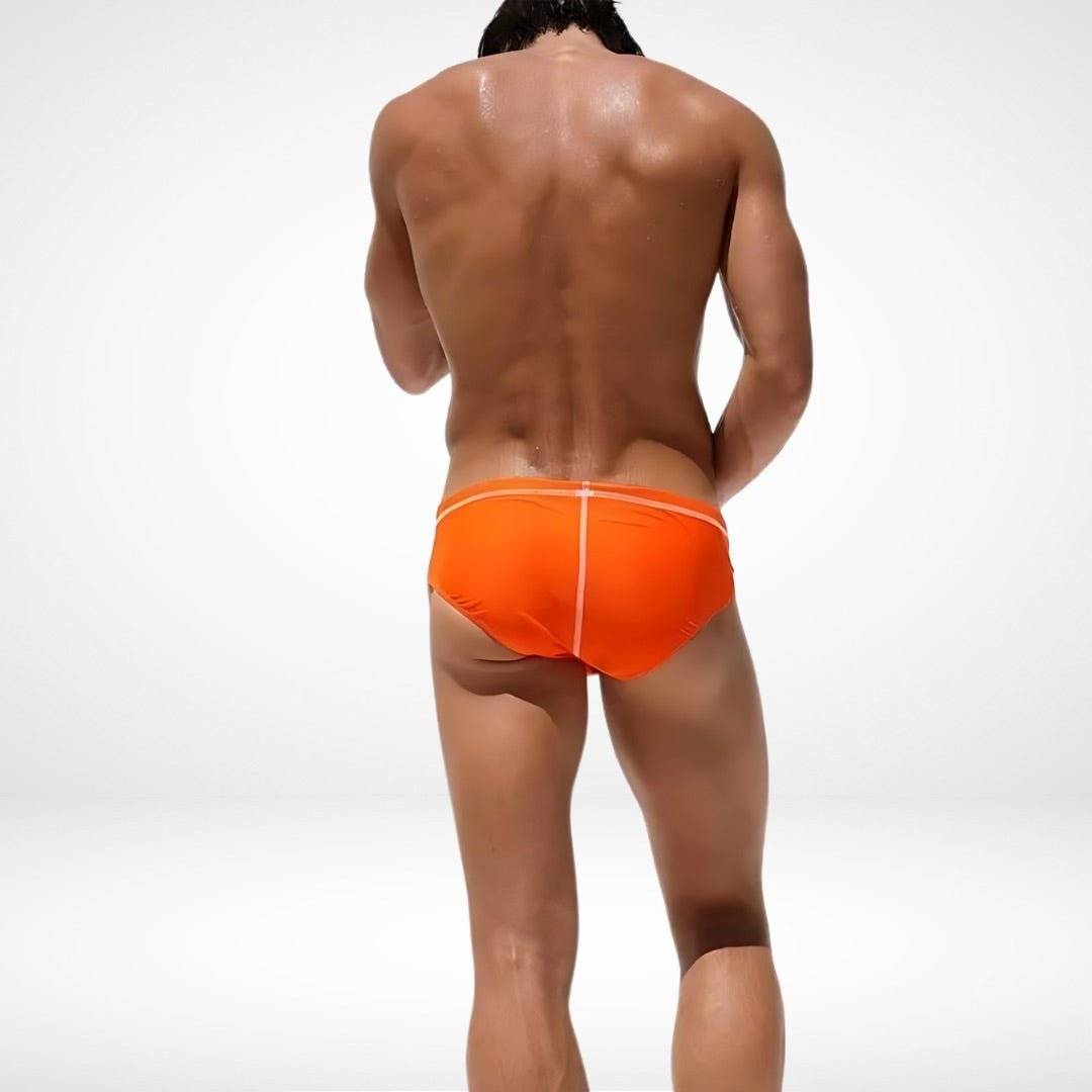 Back view of orange men's swim briefs with quick-dry fabric and snug fit, perfect for beach or poolside activities.