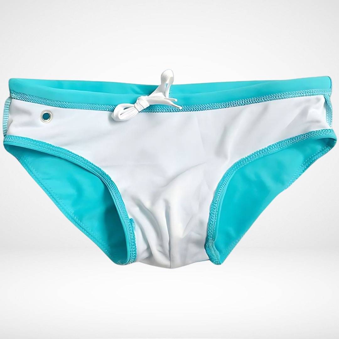 Flat lay of aqua blue men's swim briefs with white lining, side eyelet, and drawstring, ideal for quick-dry performance swimwear.