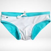 Flat lay of aqua blue men's swim briefs with white lining, side eyelet, and drawstring, ideal for quick-dry performance swimwear.