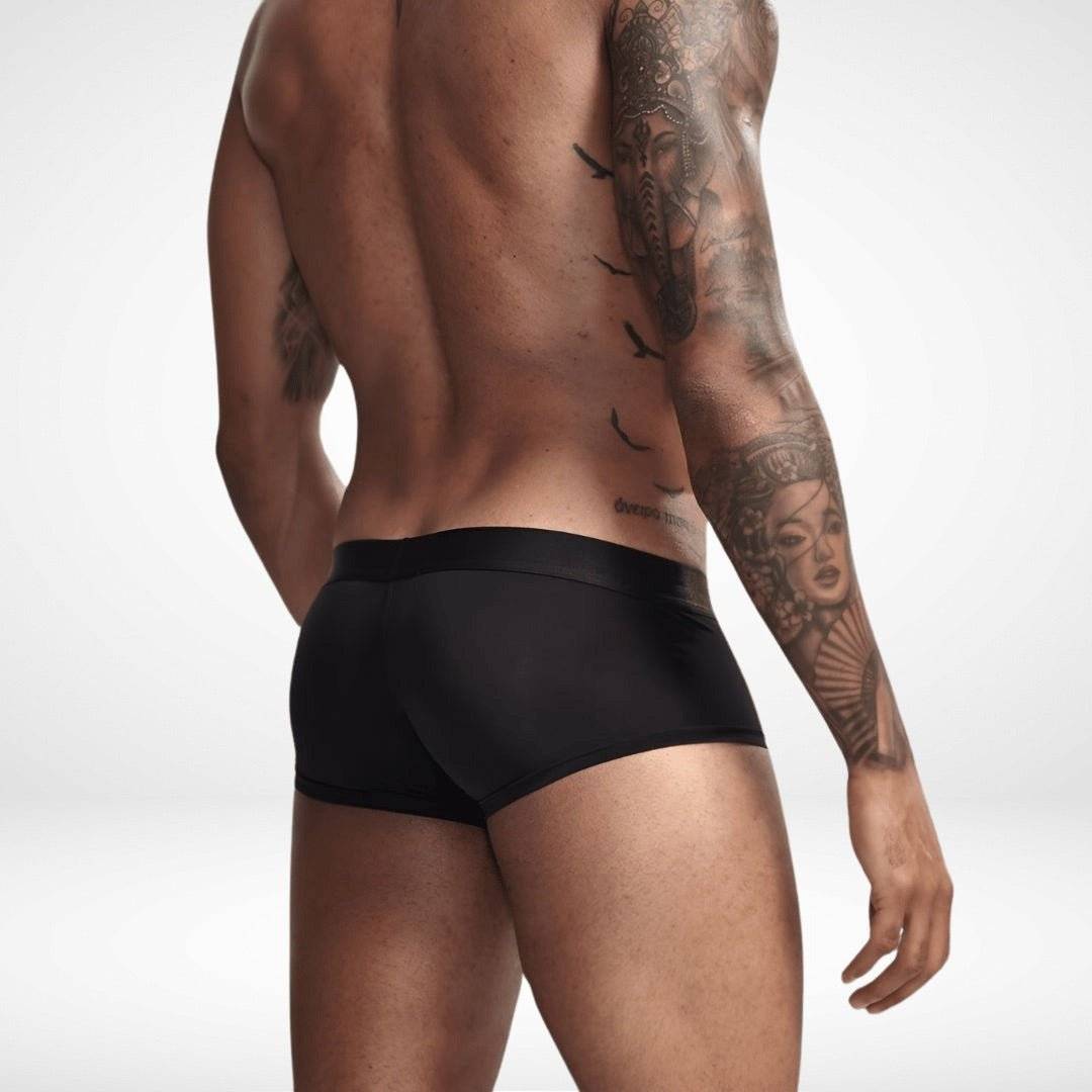 Black transparent ice silk boxer briefs shown from rear on male model. Smooth, breathable fabric with snug fit for everyday wear.