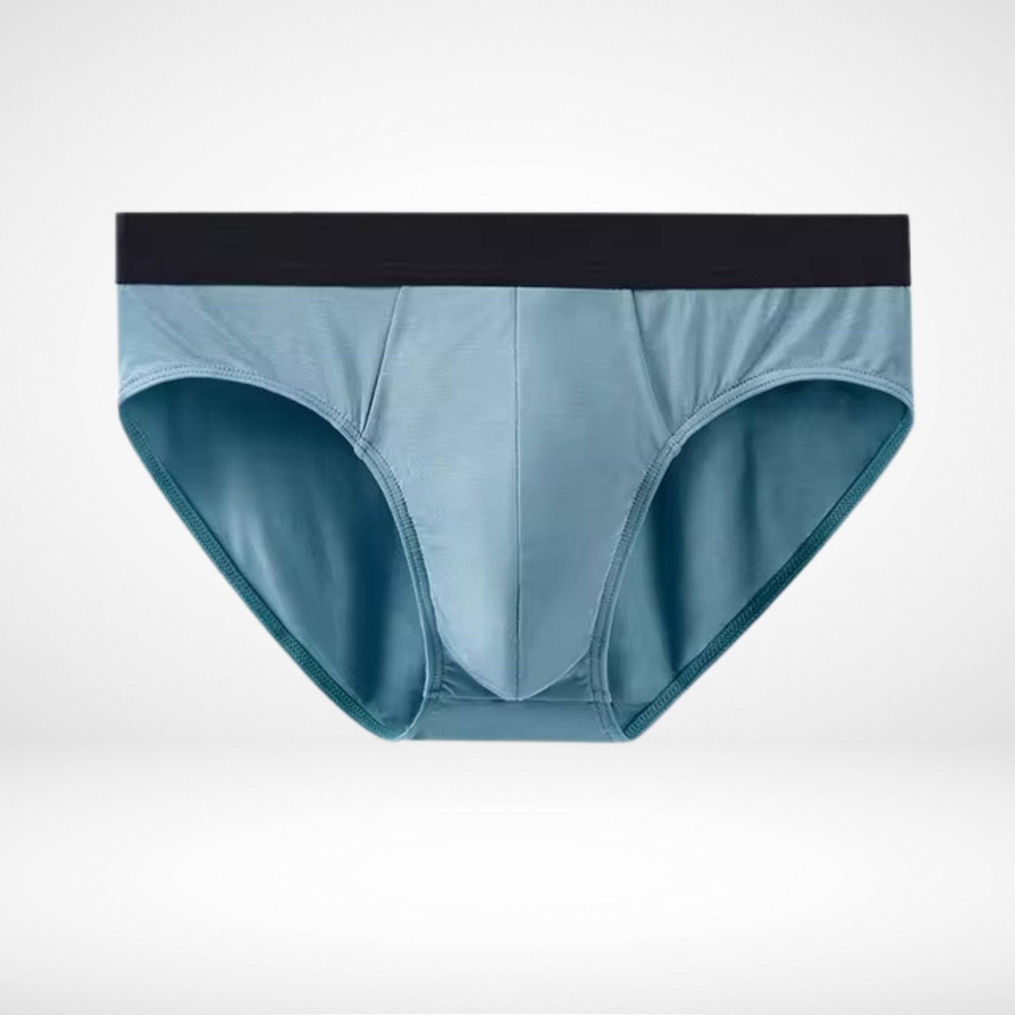 Flat lay of light blue Soft Modal Comfort Fit Men's Briefs with black waistband, ideal for moisture control and comfort.