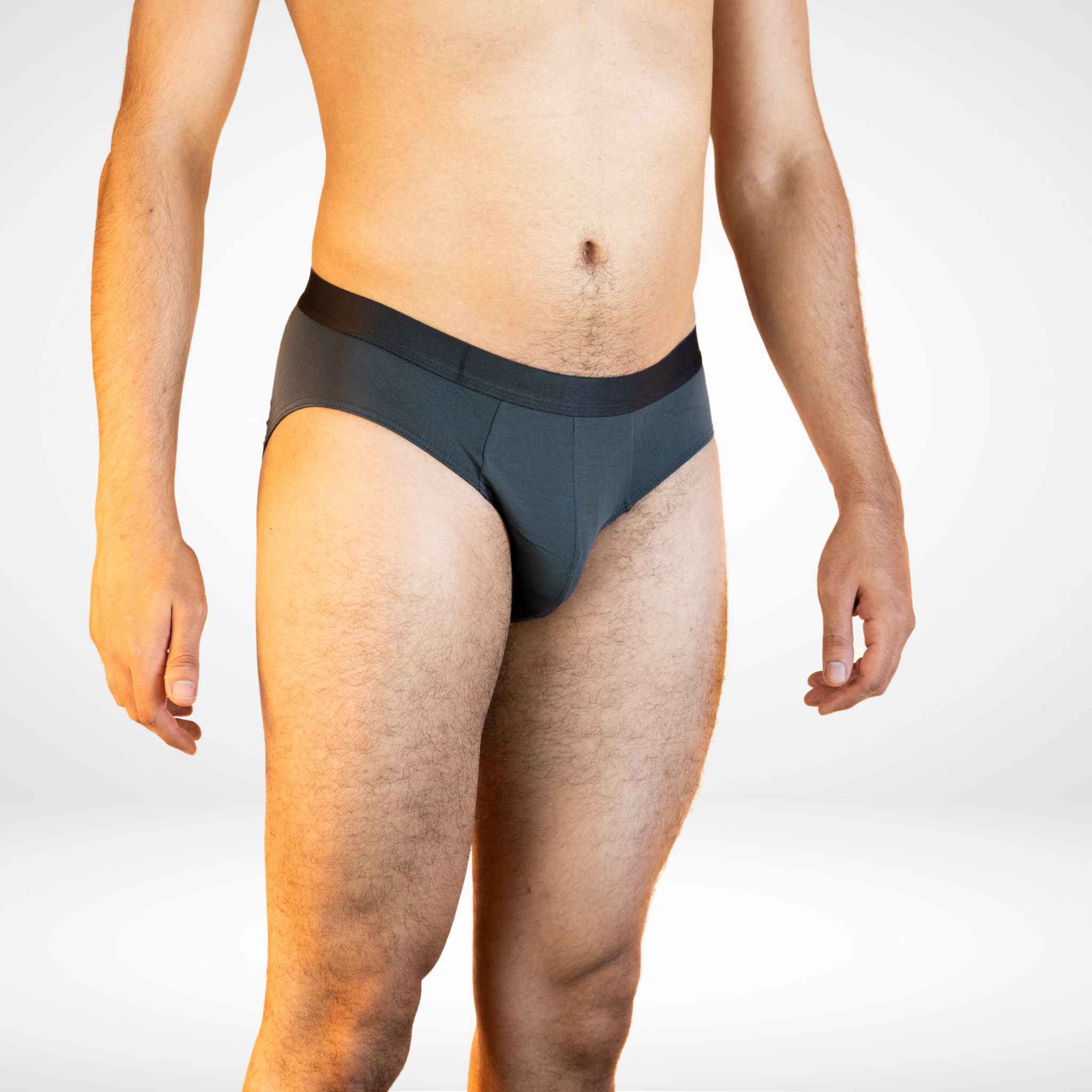 Side view of Soft Modal Comfort Fit Men's Briefs in dark grey, crafted for flexibility and breathable support.