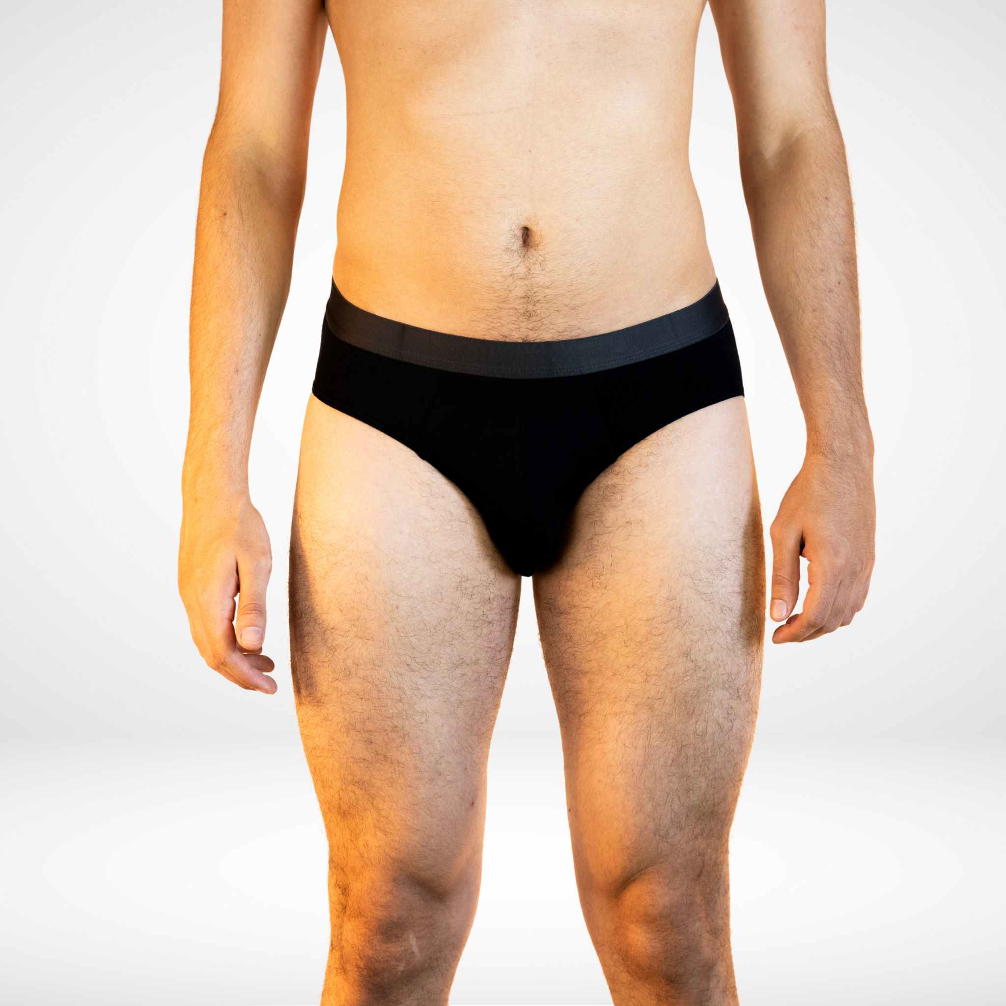 Front view of Soft Modal Comfort Fit Men's Briefs in black, featuring a snug fit and moisture-wicking fabric.