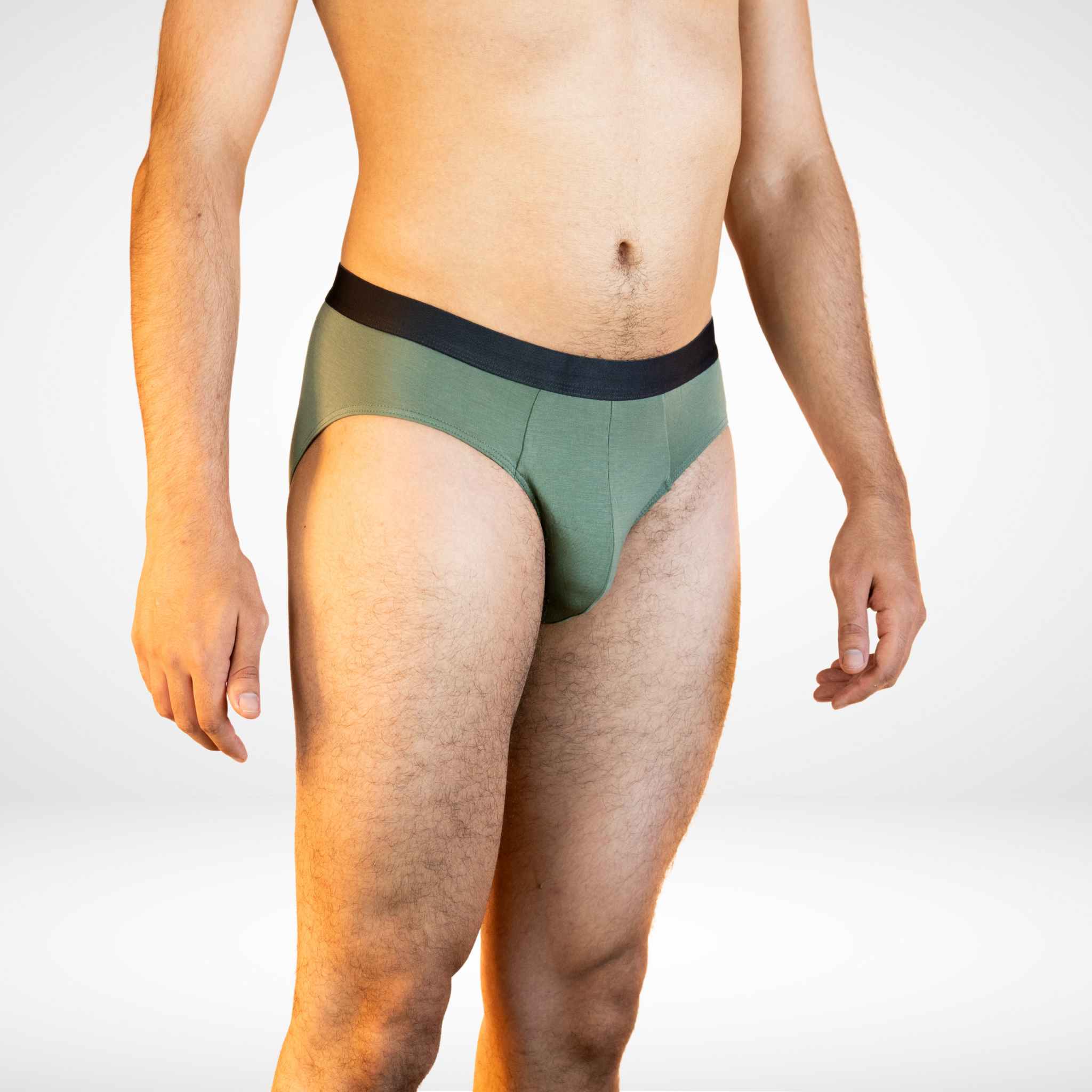 Side view of Soft Modal Comfort Fit Men's Briefs in olive green, designed for stretch and all-day freshness.