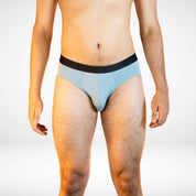 Soft Modal Comfort Fit Men's Briefs in light blue with black waistband, offering moisture-wicking and stretch for everyday wear.