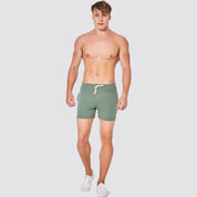 Front view of UrbanFit Basics Everyday Shorts in olive green, styled for comfort with a modern athletic fit and breathable fabric.
