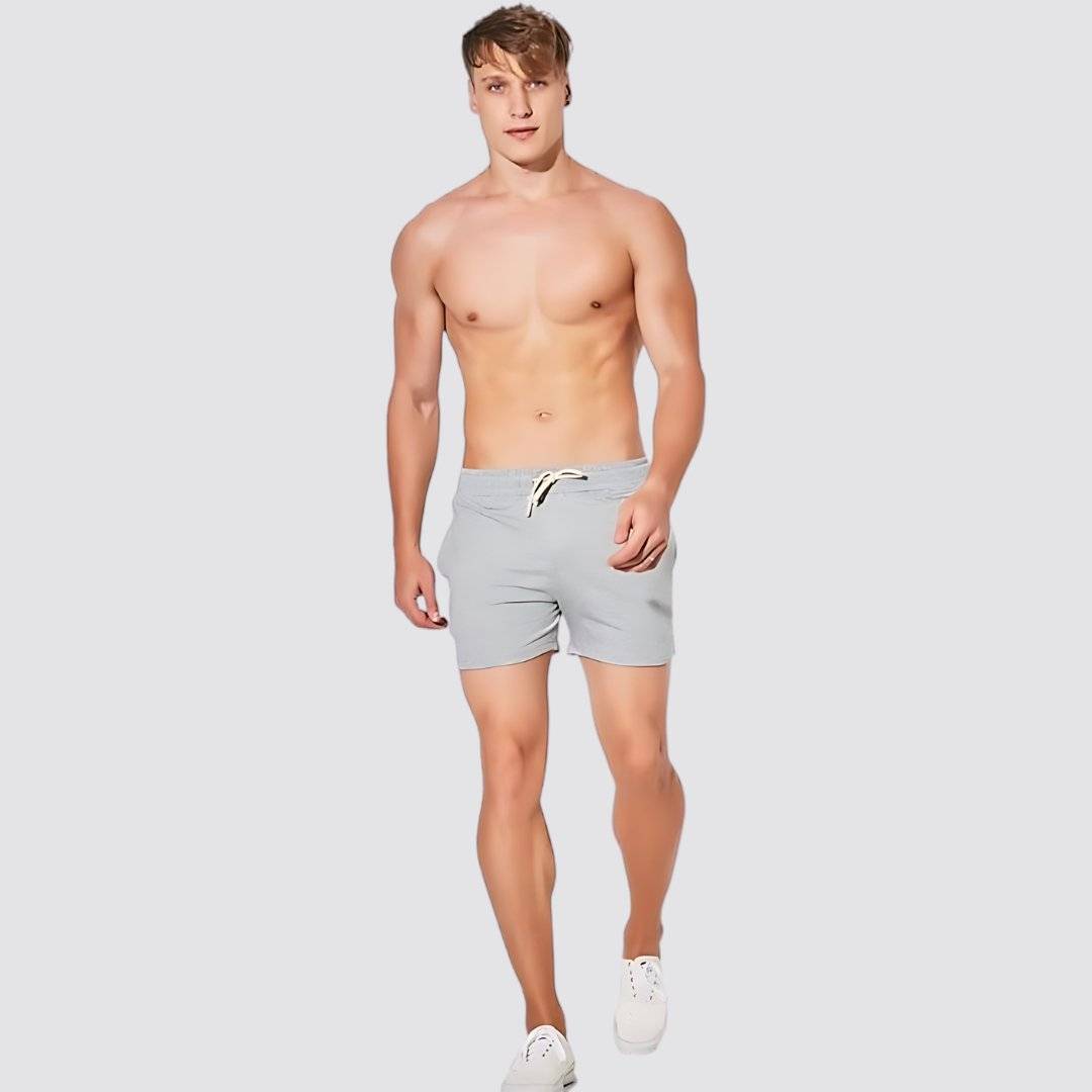UrbanFit Basics Everyday Shorts in light grey, styled for a clean, sporty look with adjustable drawstring and soft stretch fabric.
