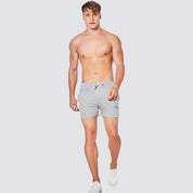 UrbanFit Basics Everyday Shorts in light grey, styled for a clean, sporty look with adjustable drawstring and soft stretch fabric.