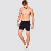Side view of UrbanFit Basics Everyday Shorts in black, tailored for movement with a sleek silhouette and adjustable waistband.