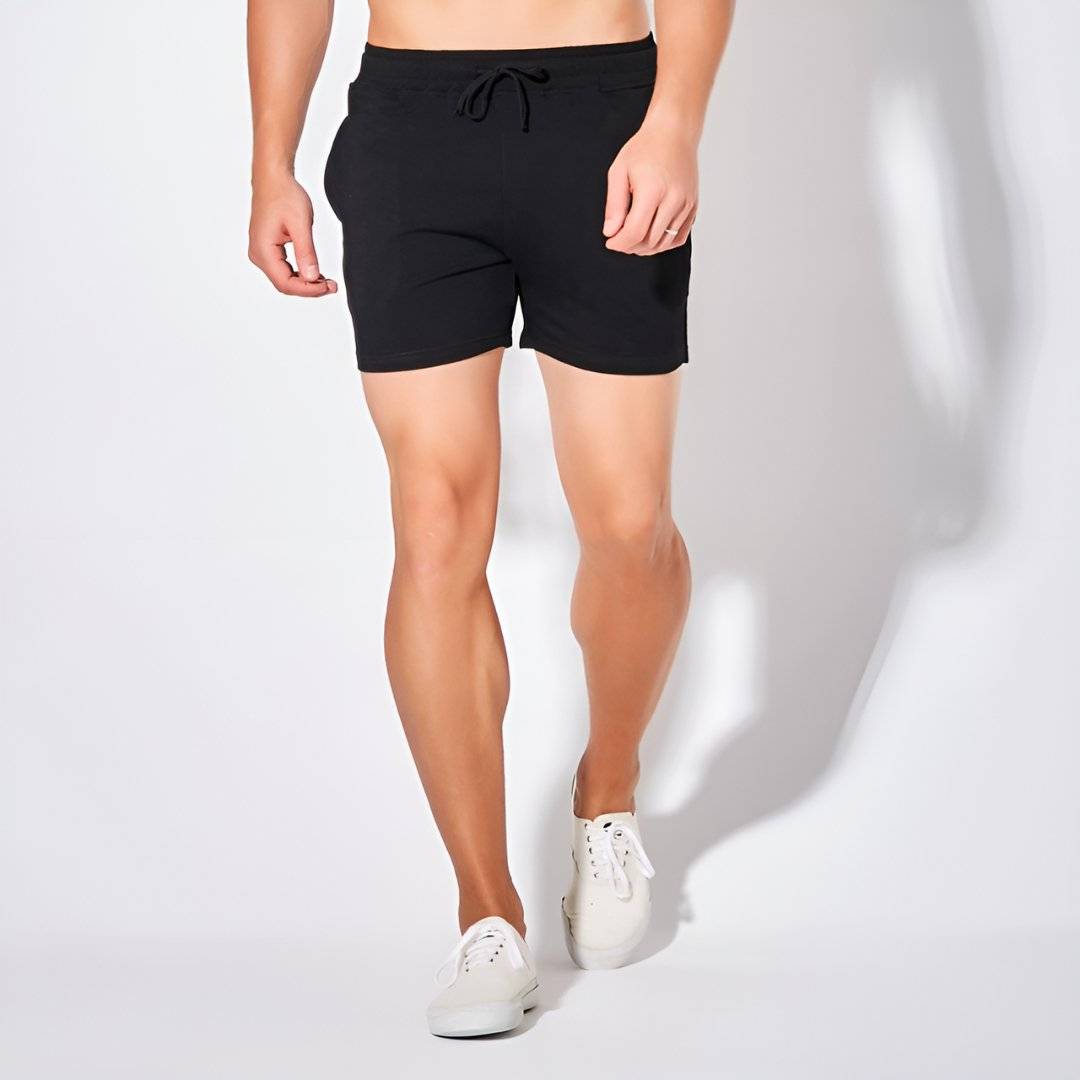 Front view of UrbanFit Basics Everyday Shorts in black, featuring soft stretch fabric and deep side pockets for everyday convenience.